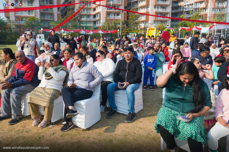 Residents and families watching performances at the River Valley Winter Carnival 2025