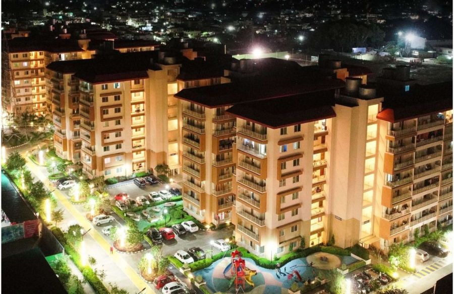 Aerial view of Bhagirathi and Ganga Towers lit up at night, River Valley Township, Dehradun