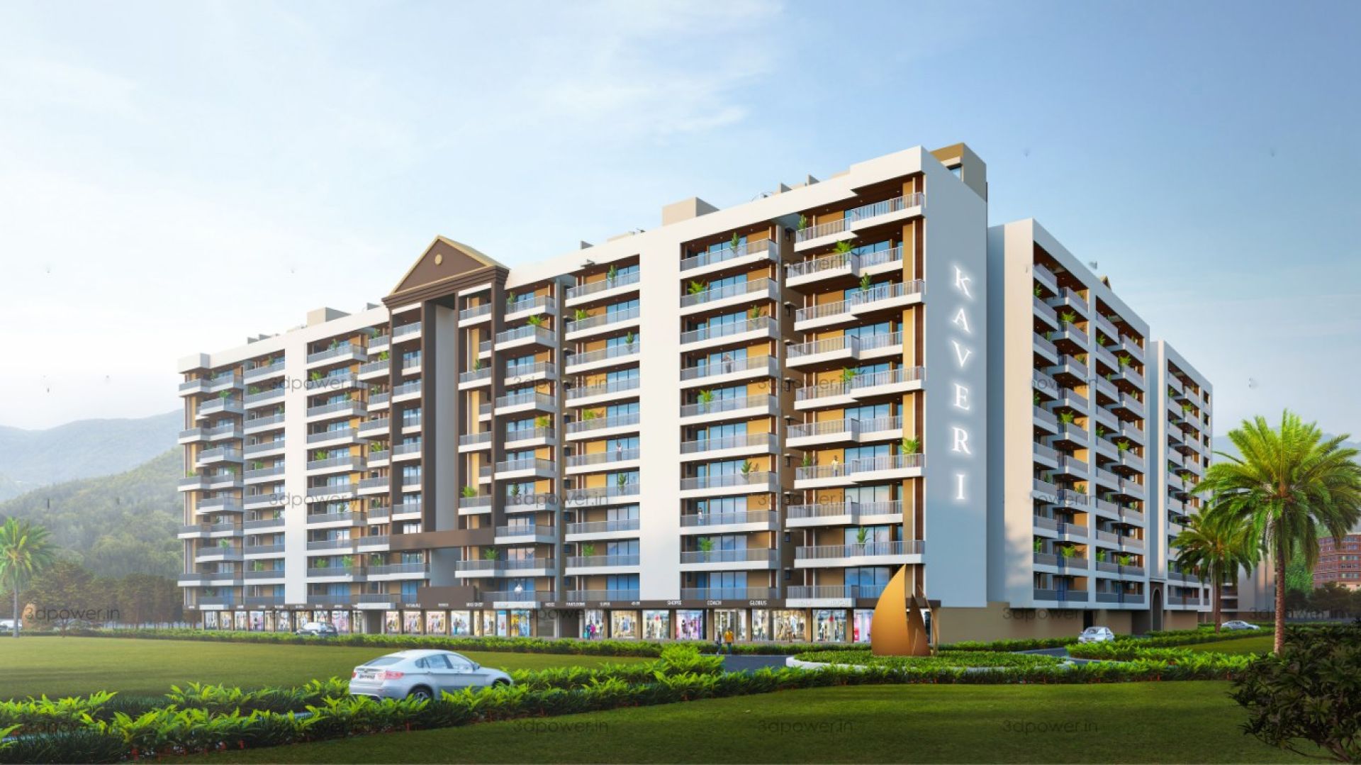 Kaveri Towers at River Valley Township, Dehradun: residential tower with balconies and landscaped lawns, hills behind