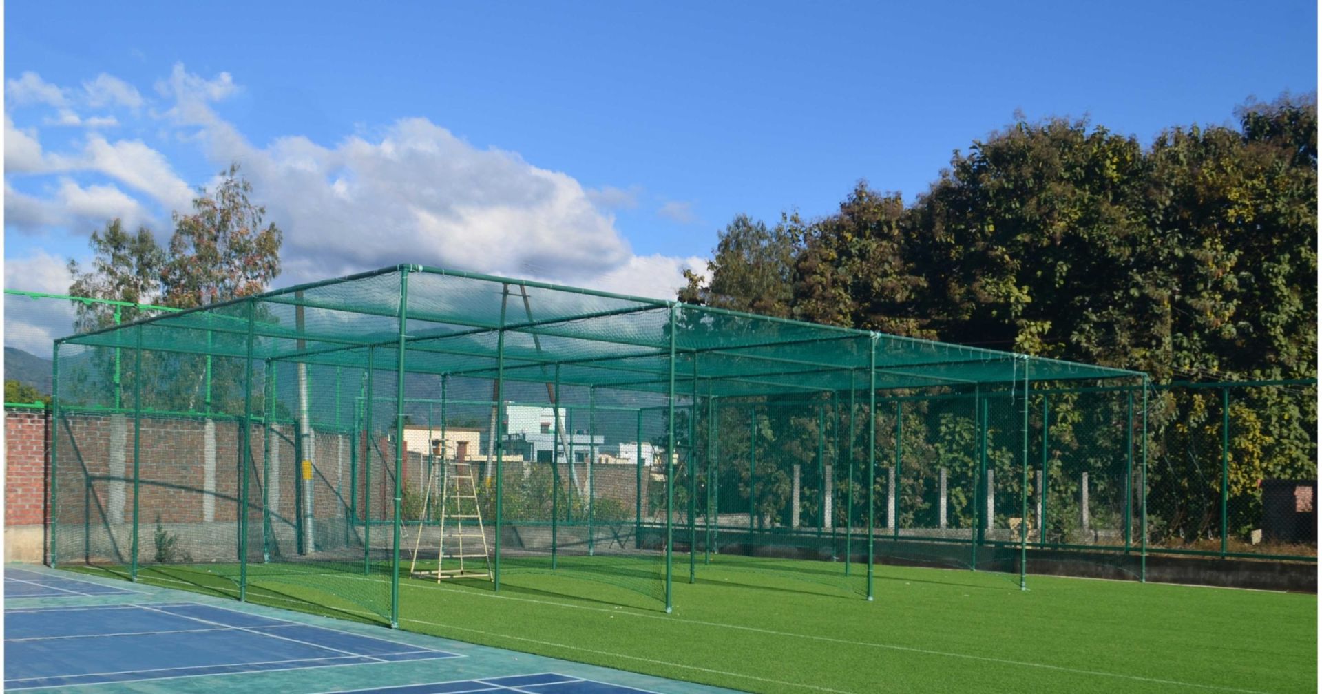 Cricket net practice facility at River Valley Township, Dehradun