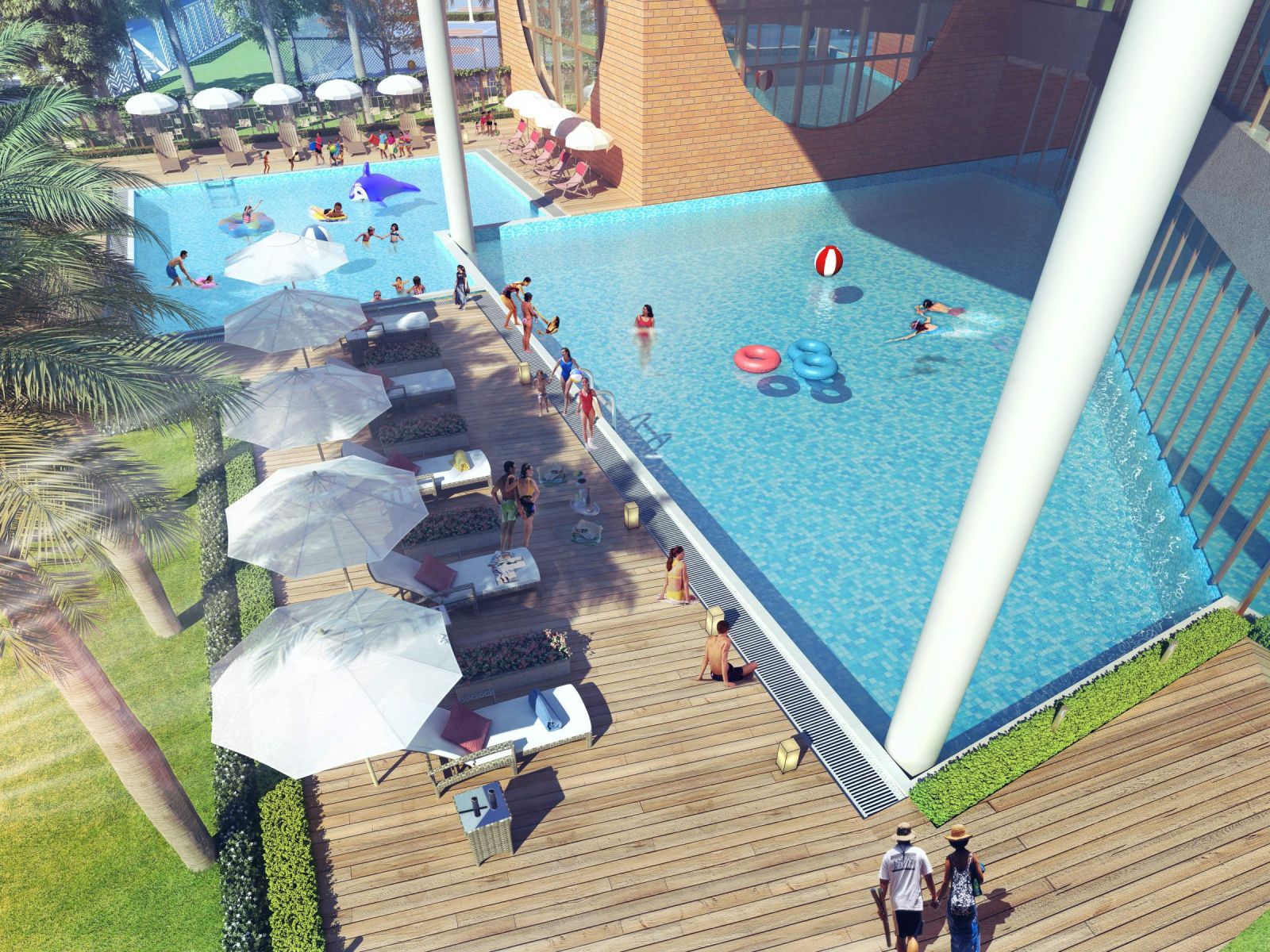 Residents swimming and relaxing at the River Valley Township club swimming pool, Dehradun