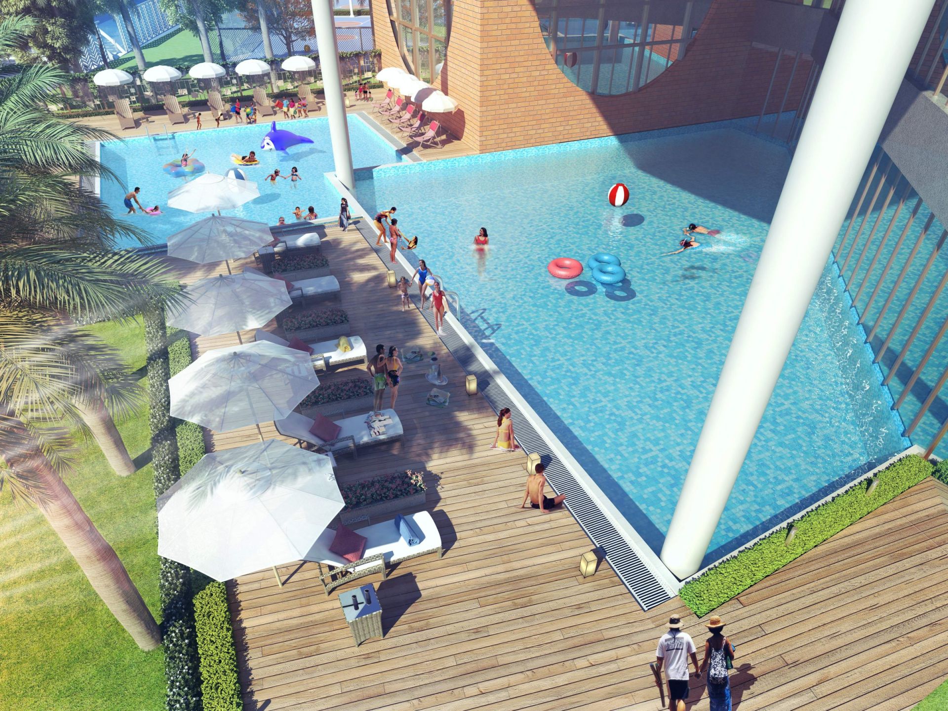 Residents swimming and relaxing at the River Valley Township club swimming pool, Dehradun